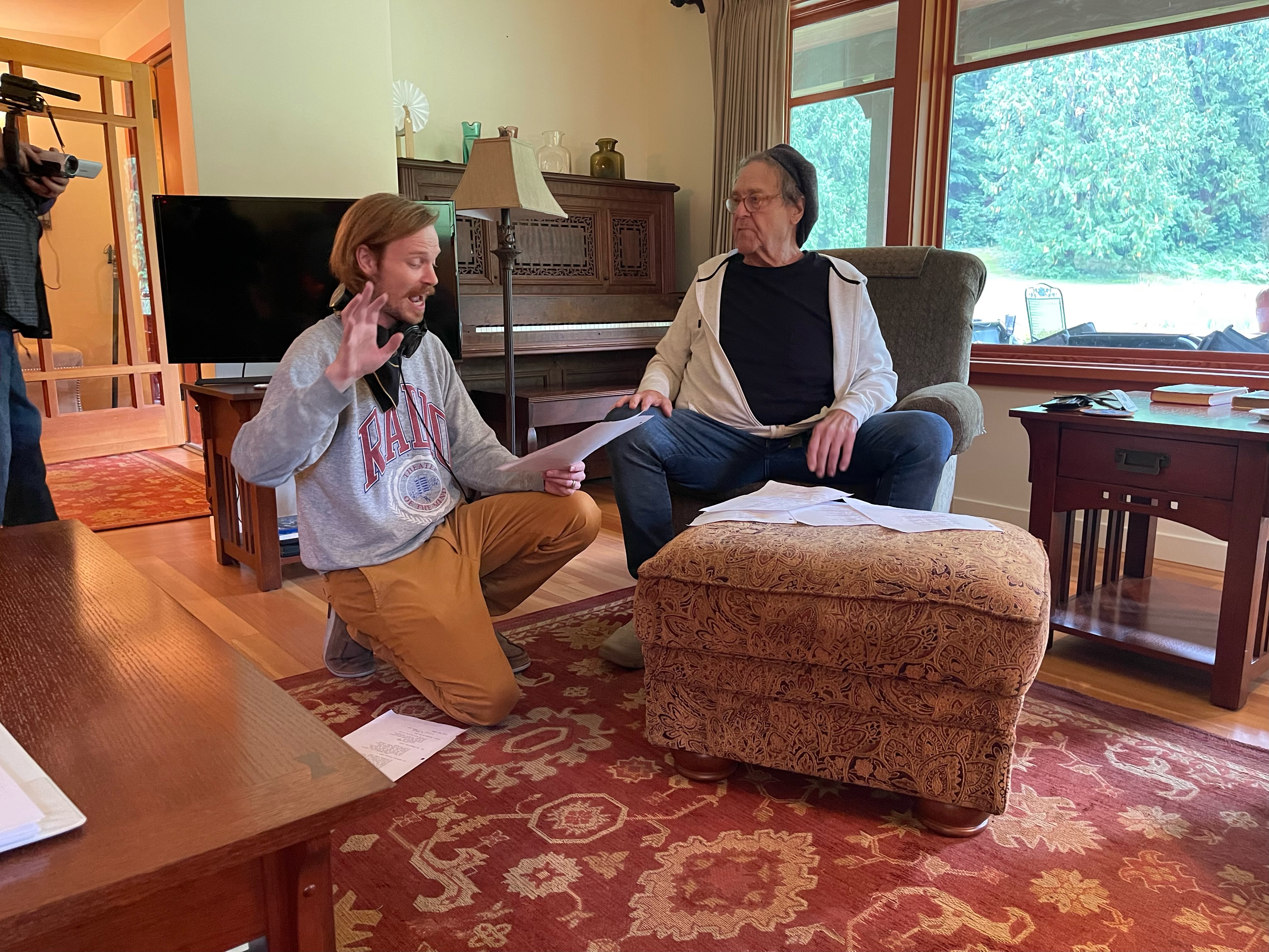 Behind the scenes: actors recording in a living room.